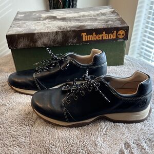 Timberland Black Leather Flats with White Accents